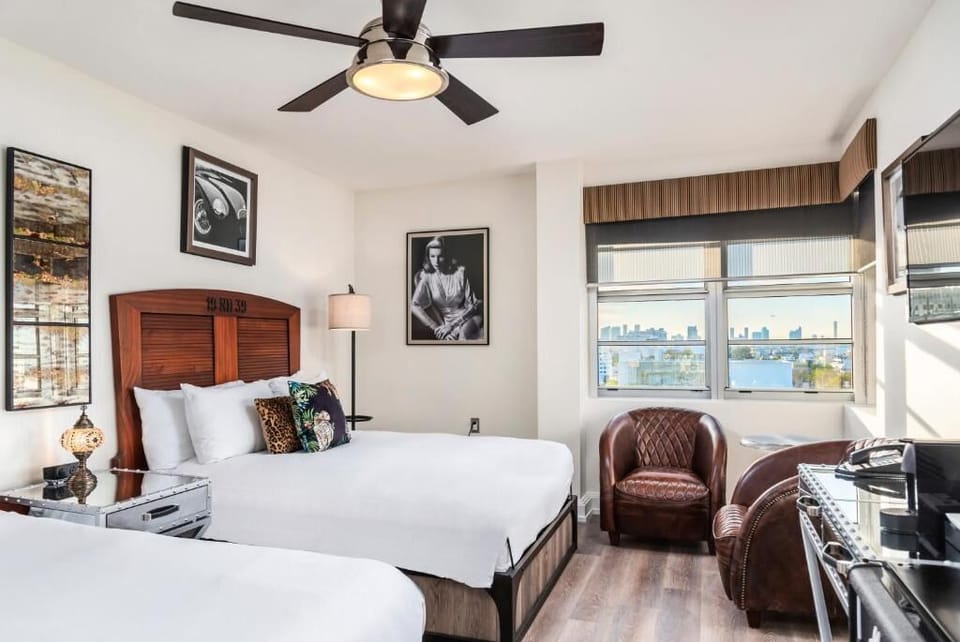 Unwind in bright double beds with sweeping skyline views.