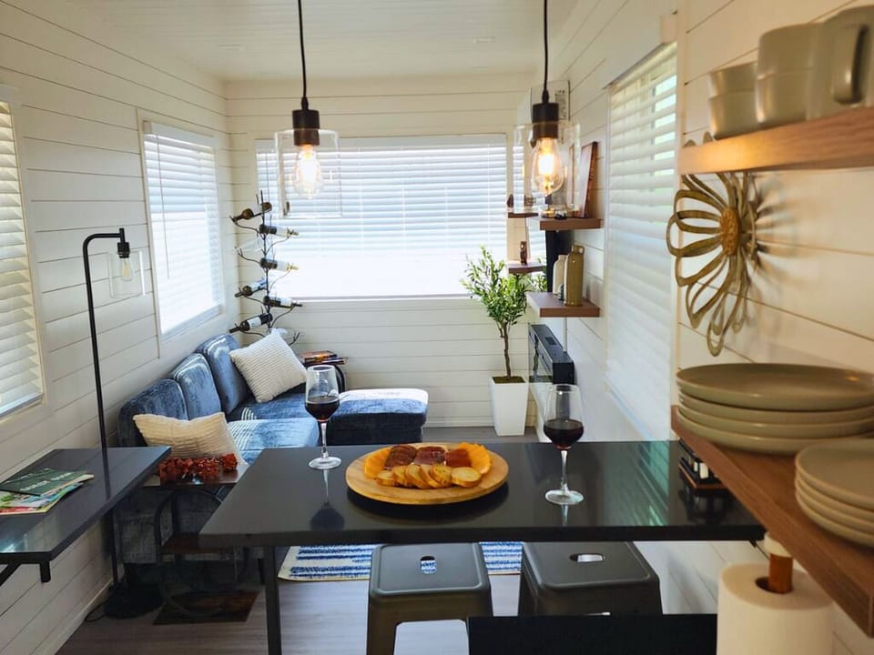 Charming Living Space: Bright interiors, stylish décor, and a perfect spot for unwinding with wine!