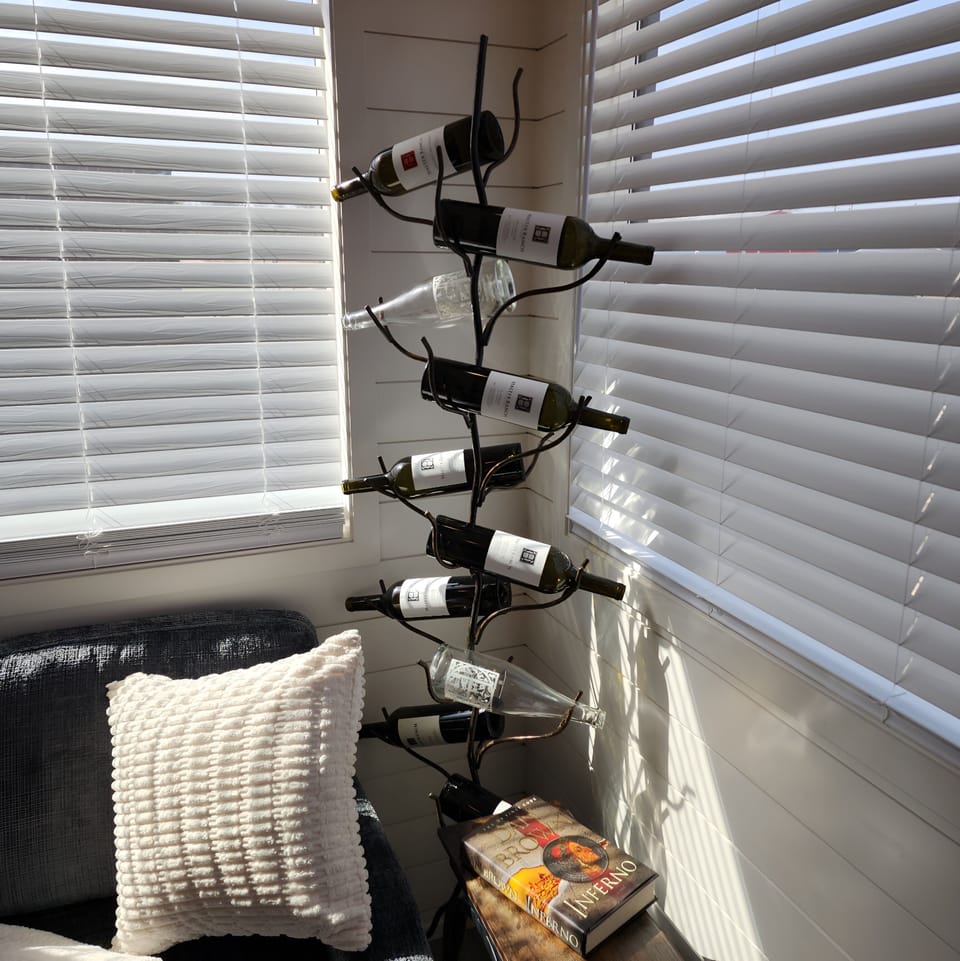 Wine Lounge: Sip and unwind in this stylish nook bathed in natural light! Cheers to relaxation!