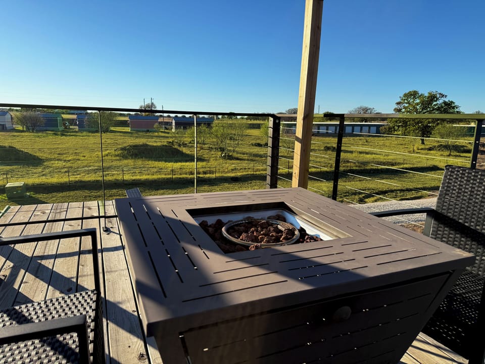 Evenings by the fire pit at Station on the Vines. 🔥