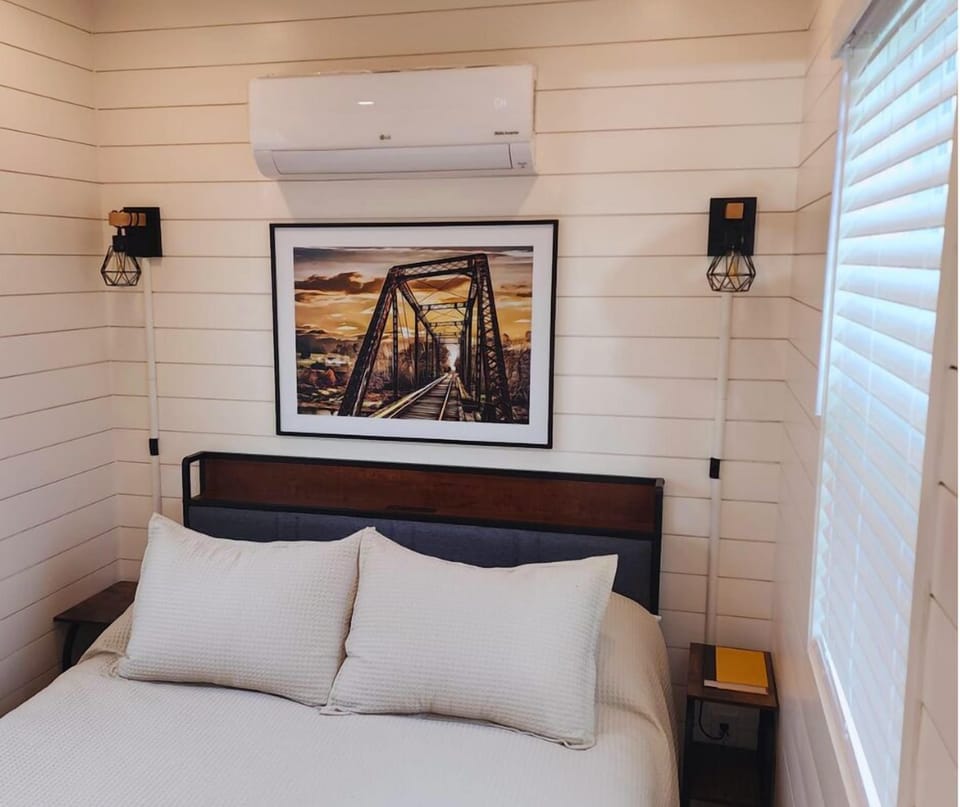Dreamy Bedroom Retreat: Enjoy artistic vibes and serene views from this stylish space!