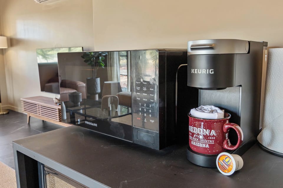 Microwave, coffee maker, wine fridge.