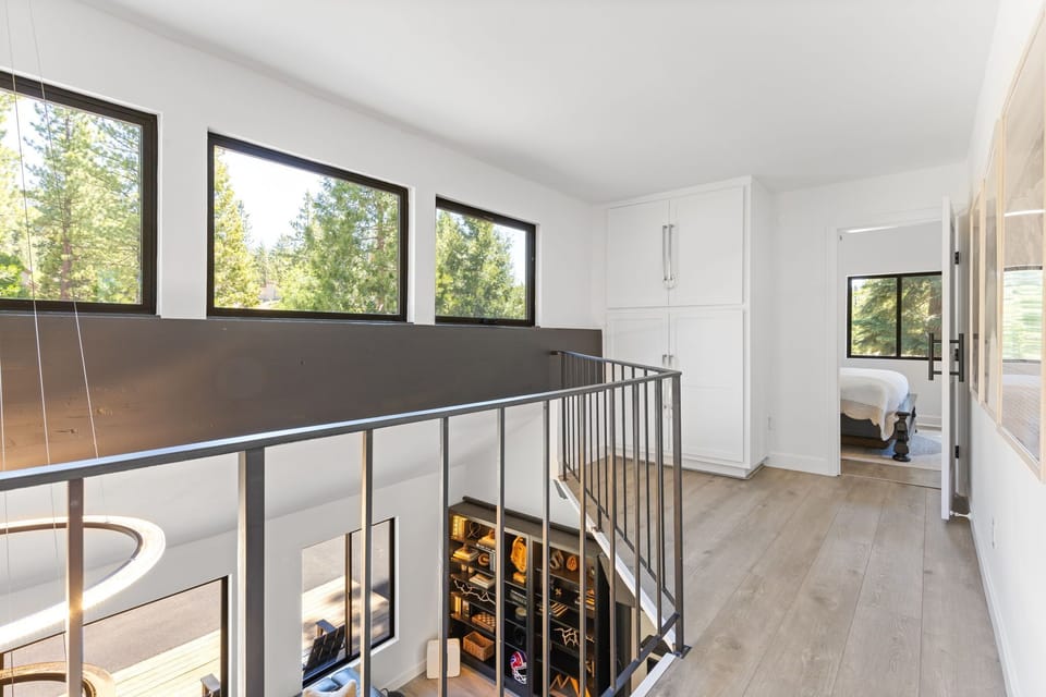 Catwalk to bedrooms overlooking Living Room
