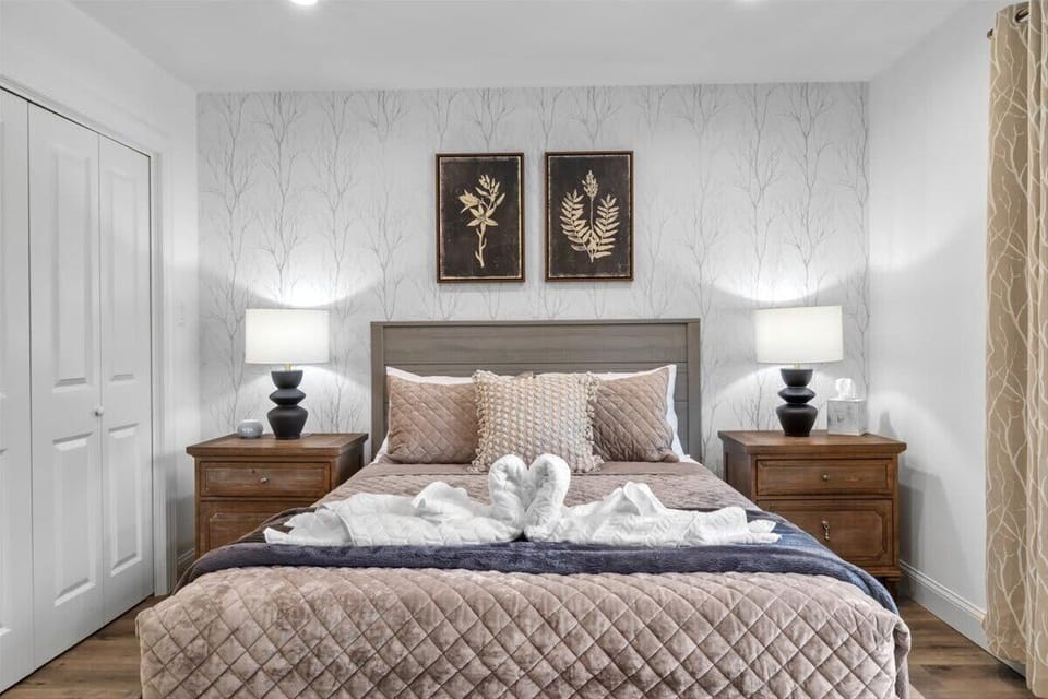 Drift off under cozy linens in this peaceful bedroom with natural touches.