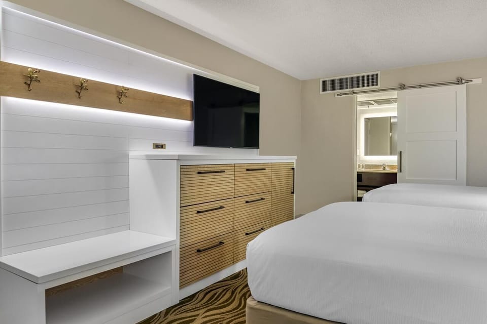 Enjoy movie nights with a large TV and sleek storage.