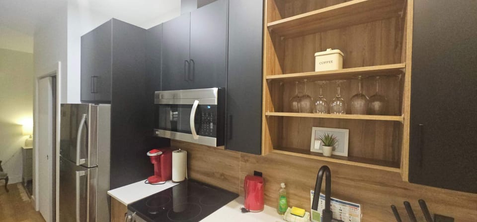 Fully stocked kitchen featuring stainless steel appliances and elegant finishes