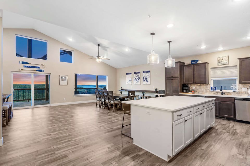 The open, airy kitchen offers ample space & every home comfort