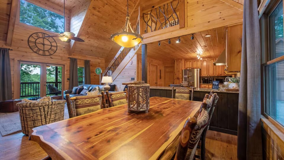 Dine and relax in style—vaulted ceilings, rustic charm & forest-view deck!