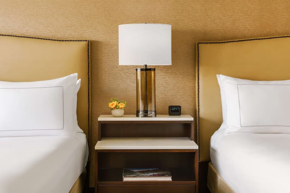 Enjoy bedside lighting and easy charging within arm’s reach.