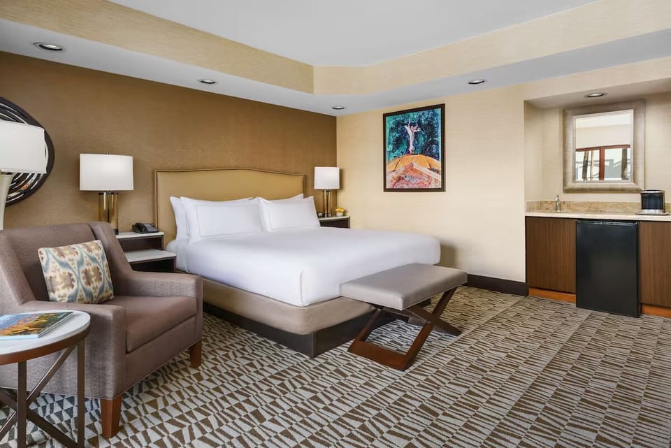 Recharge with an in-room mini-fridge and quick snack station.