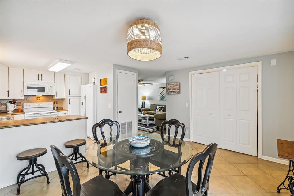 Bar seating for 2 and dining table for 4