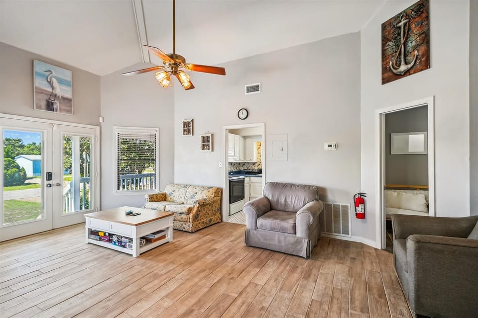 Living room Area leads into kitchen and Second Bedroom with Bunks and futon
