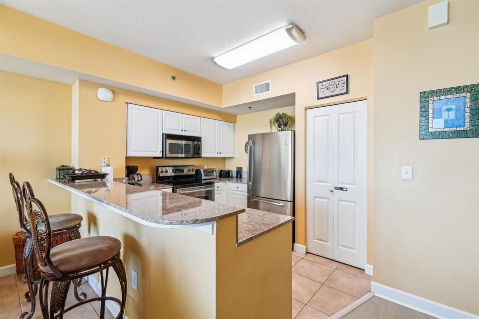 Kitchen with bar seating for 2