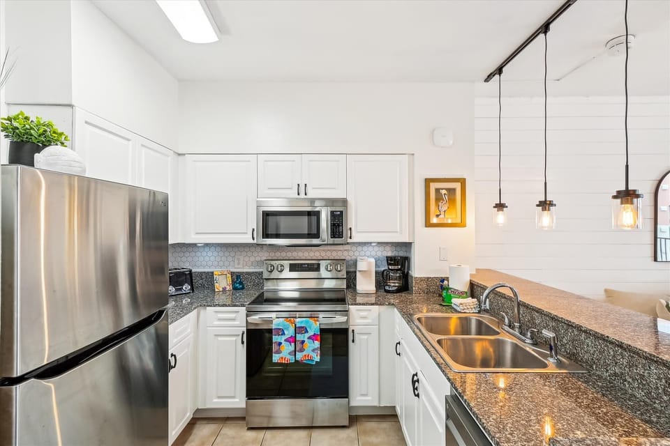 Full Stainless Steel Kitchen 
*Standard coffee pot