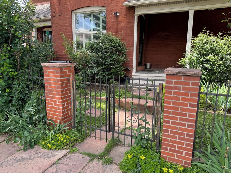 Entrance gate from 1st Ave