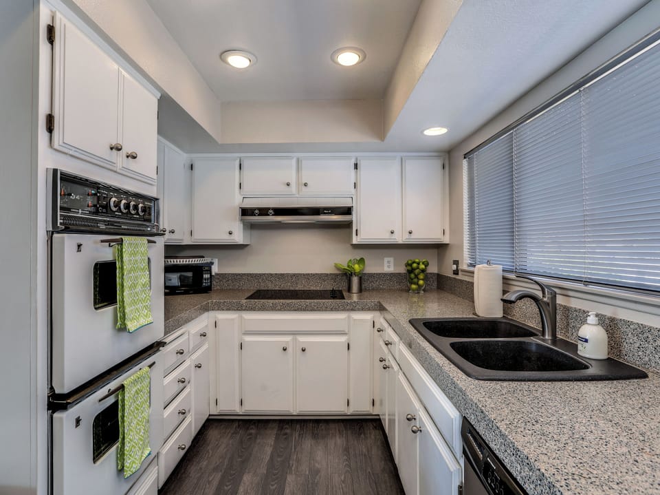 Fully equipped kitchen with modern appliances and ample counter space