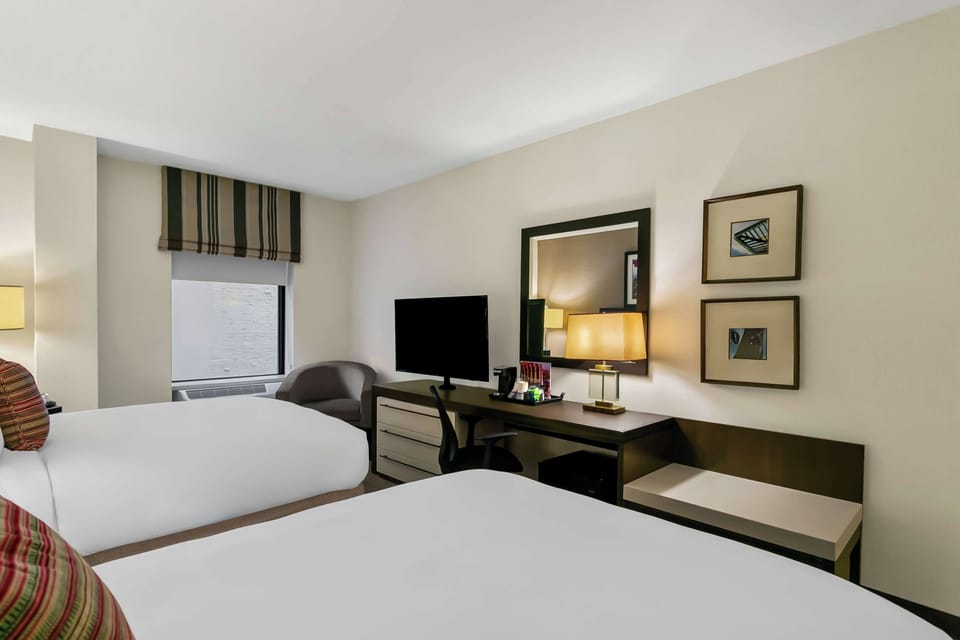 Kick back after exploring with cozy seating and bedside lighting.