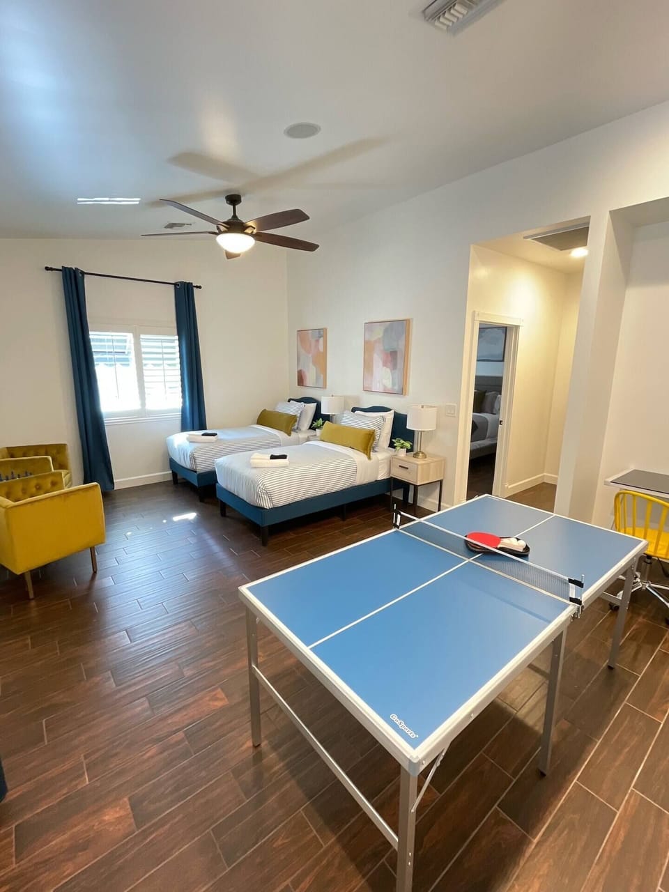 Additional family room with ping pong table and 2 additional beds