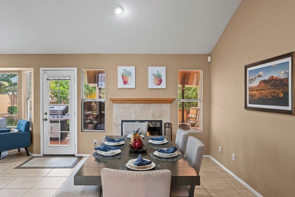 Dine in style next to a cozy electric fireplace — perfect for morning coffee or evening meals.