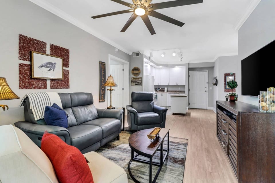 The main living space includes living, dining and kitchen - all opening to the beautiful views from the 2nd floor balcony.