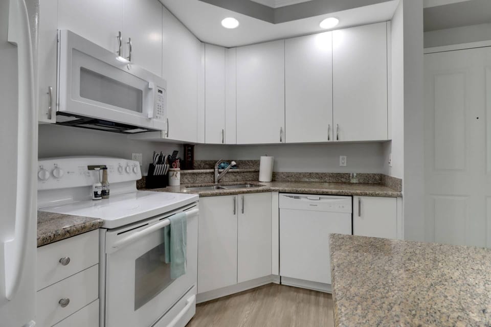 Cookware, dinnerware, many kitchen tools and small appliances are provided for your use.