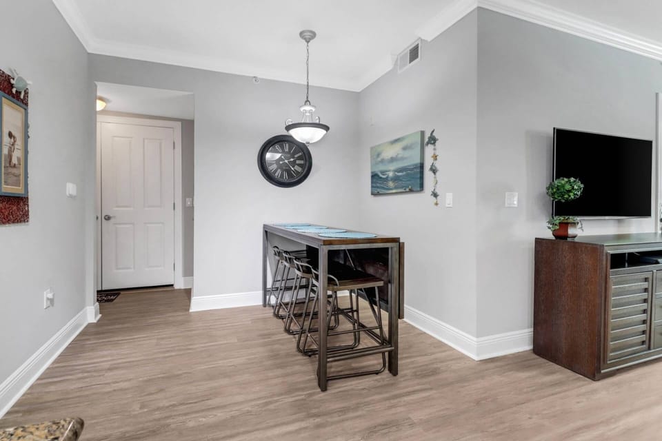 The eating bar has a drop-leaf that can easily convert to a table, if desired.