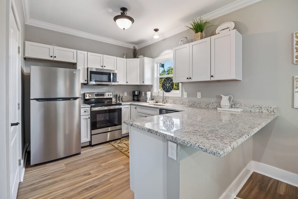 Carey Me Away Unit 39C at Purple Parrot - This kitchen looks like it is out of a magazine.