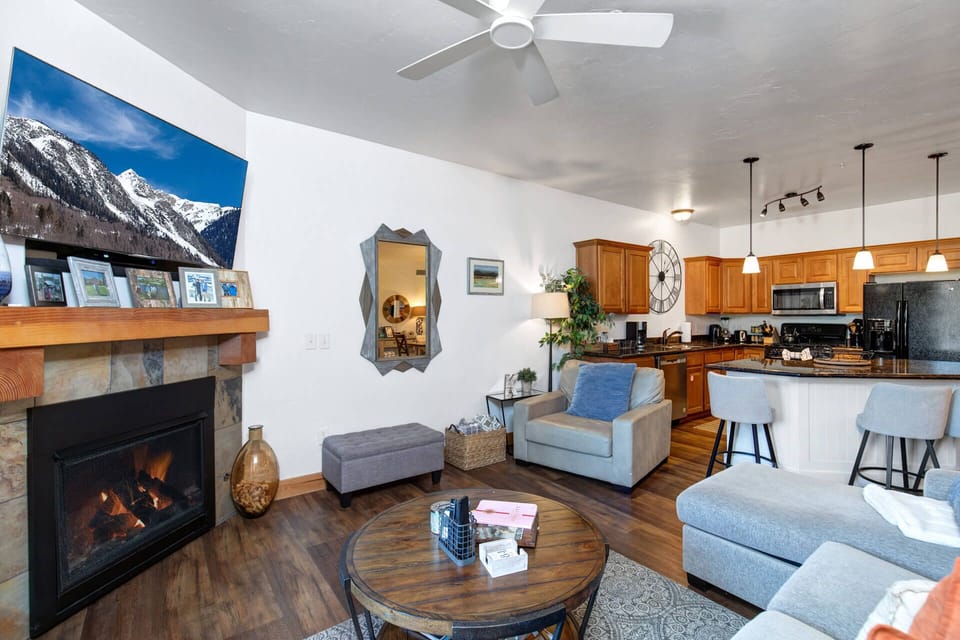 Bear Hollow 3303: Living room with Queen sleeper sofa, gas fireplace, and private balcony access