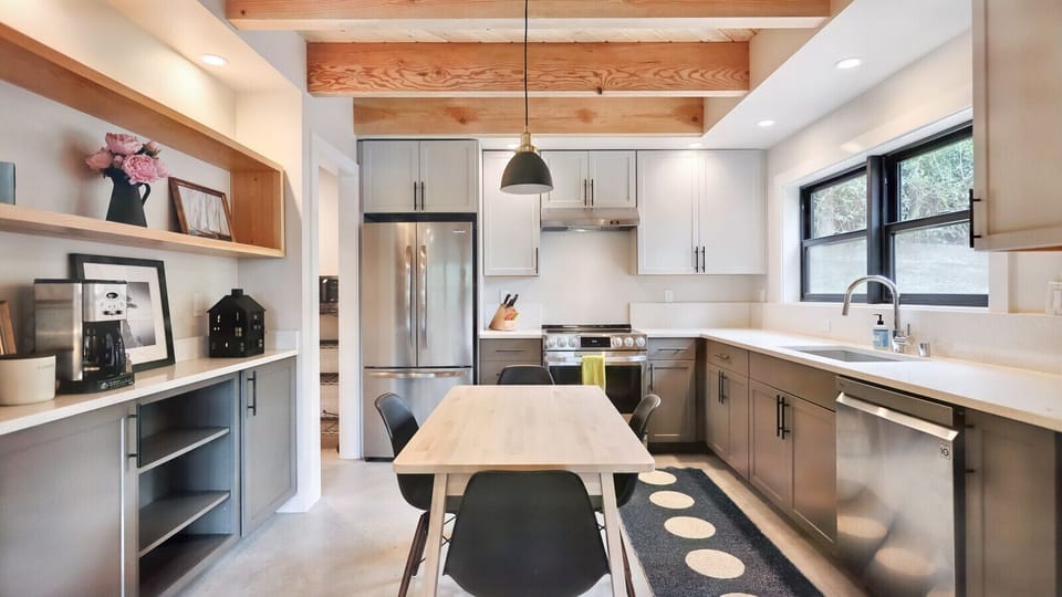Dine in Hygge Style – Scandinavian-inspired dining for four with soft lighting and modern simplicity.