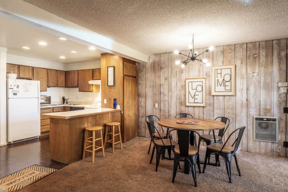 Dining table with seating for 6 and additional counter seating 