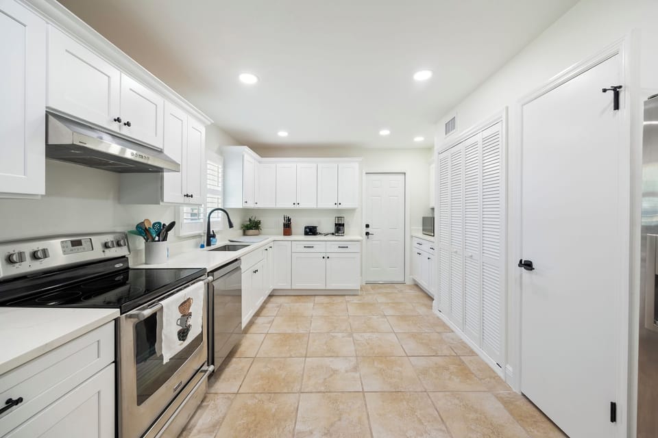 kitchen with oven, microwave, coffee maker and dishwasher. Large pantry!
