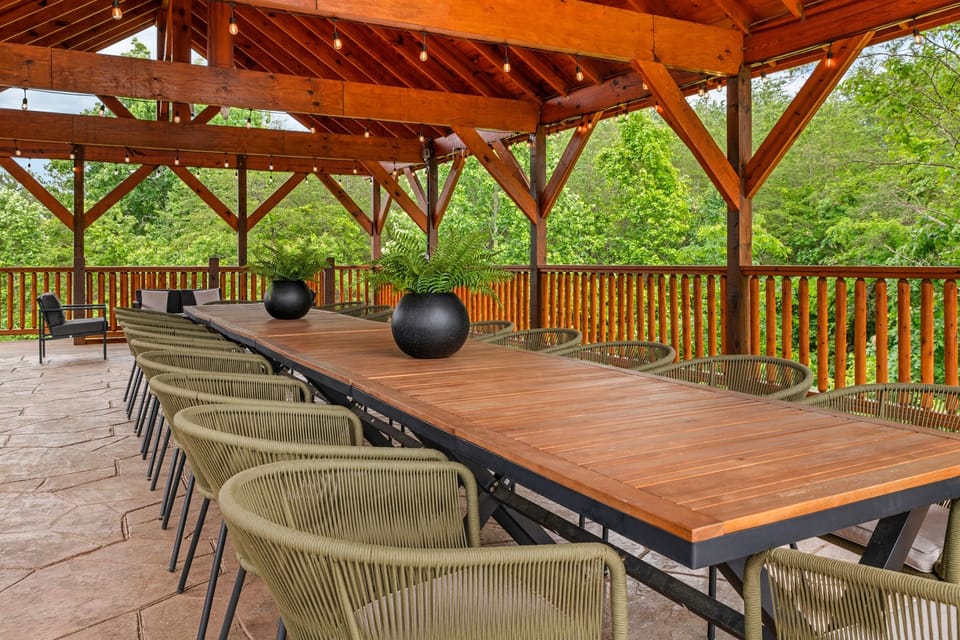 Outdoor dining with a side of mountain views. (House 1)