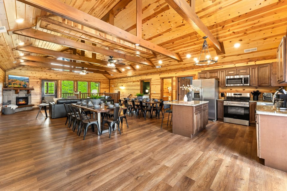 Main living area with ample seating, a fireplace, and large TV for easy relaxation.