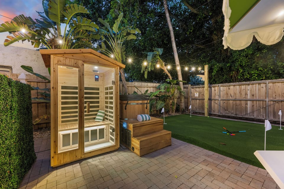 Unwind & Play in Paradise 🌿⛳ Enjoy a rejuvenating session in the private infrared sauna, then test your skills on the backyard putting green—all under the glow of charming string lights.