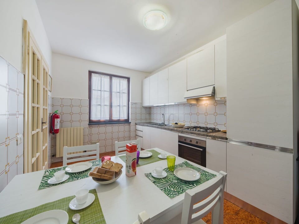 Interior Design, Flooring, Floor, Wood, Ceiling, Furniture, Room, Kitchen, Lighting, Countertop