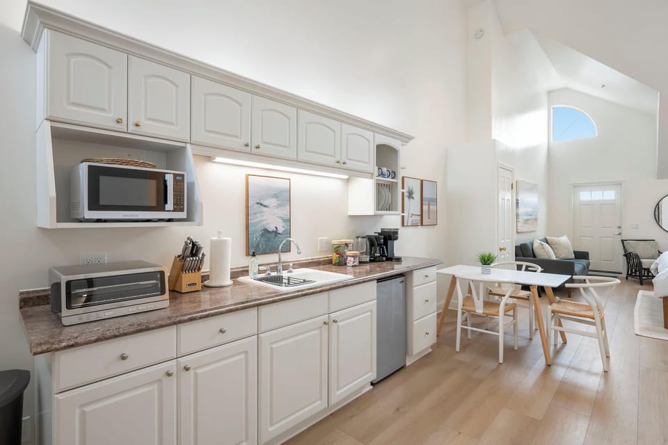 Fully equipped kitchen with modern appliances and sleek design