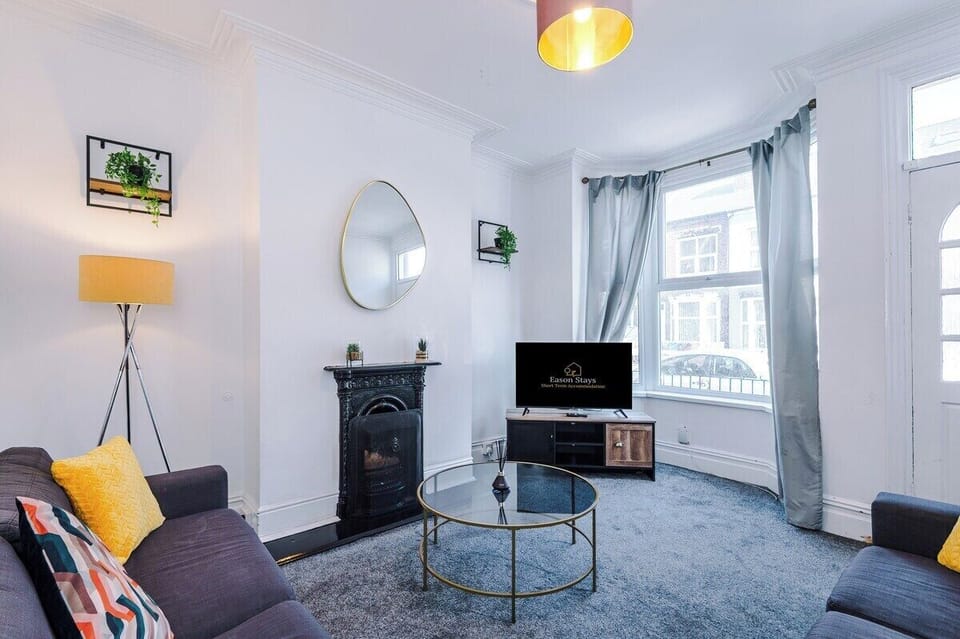 After a busy day, relax on the comfy sofa and enjoy your favorite shows on the flat-screen TV — perfect for a cozy night in.