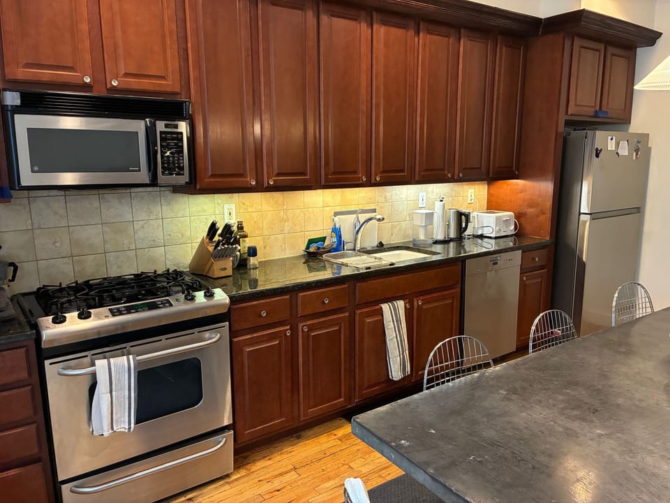 Stove, microwave, garbage disposal, microwave, large fridge, all appliances