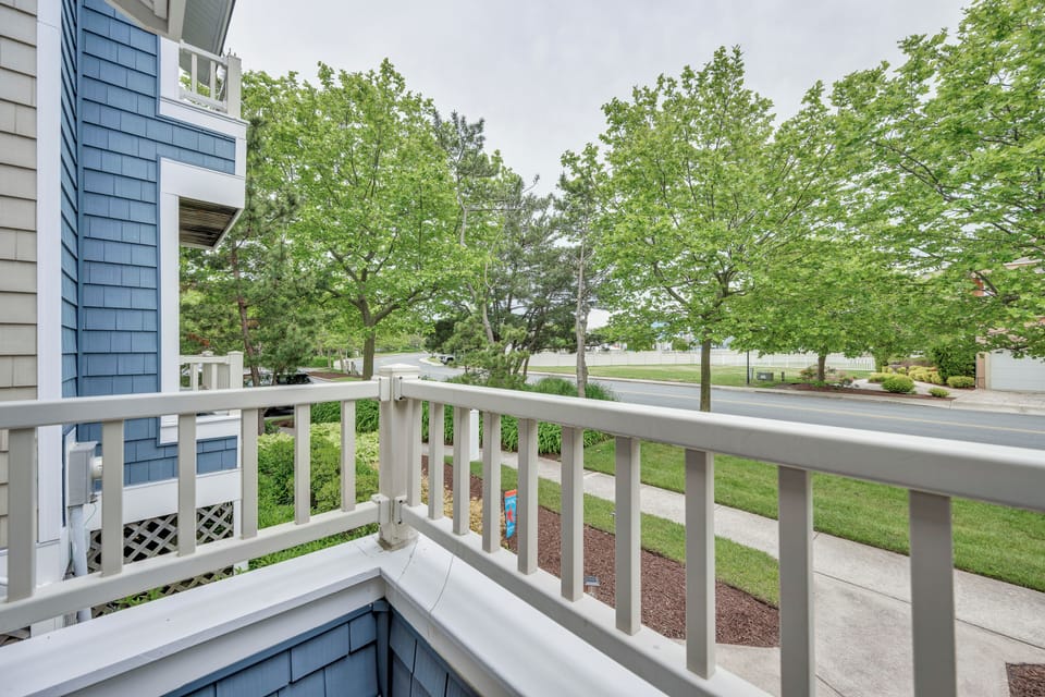 View to pool from small porch off of Den
