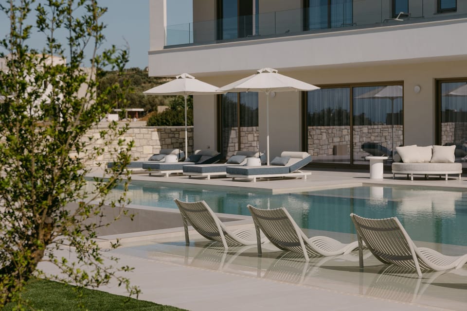 Mornings begin with a refreshing swim in the sparkling pool featuring swim-beds.