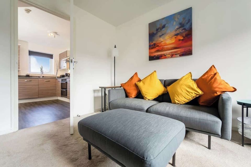 Cozy, bright, and airy living room with comfortable seating. Perfect for relaxing and unwinding.