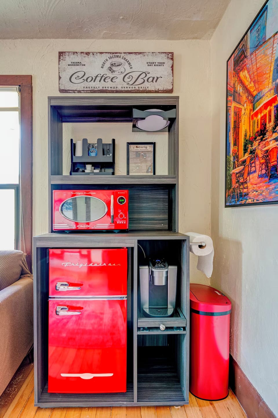 Fully stocked coffee bar. Complimentary bottled water and ice is in the fridge.
