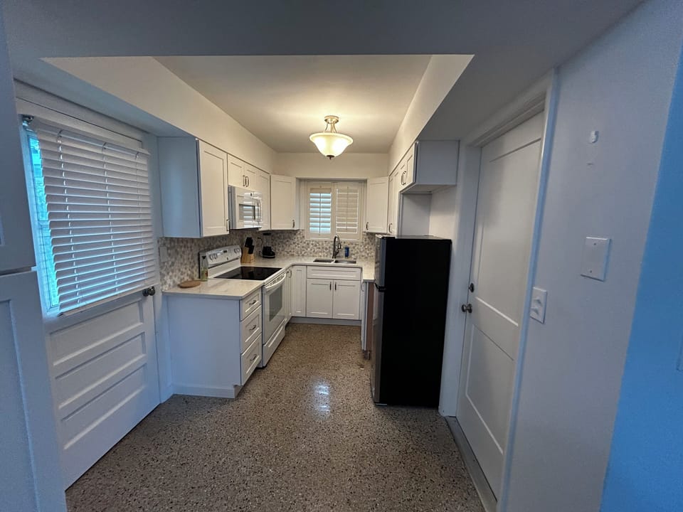 With an additional fridge in the garage, this kitchen plenty of storage for you.