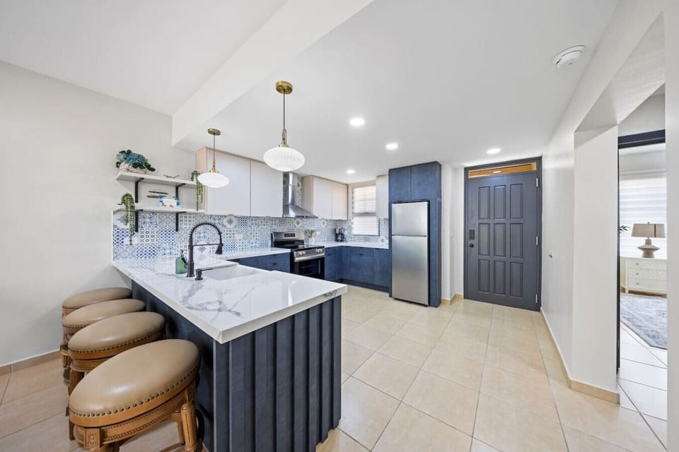Step into culinary perfection with this sleek and modern kitchen. A chef`s dream, where style meets functionality, making every meal a masterpiece.