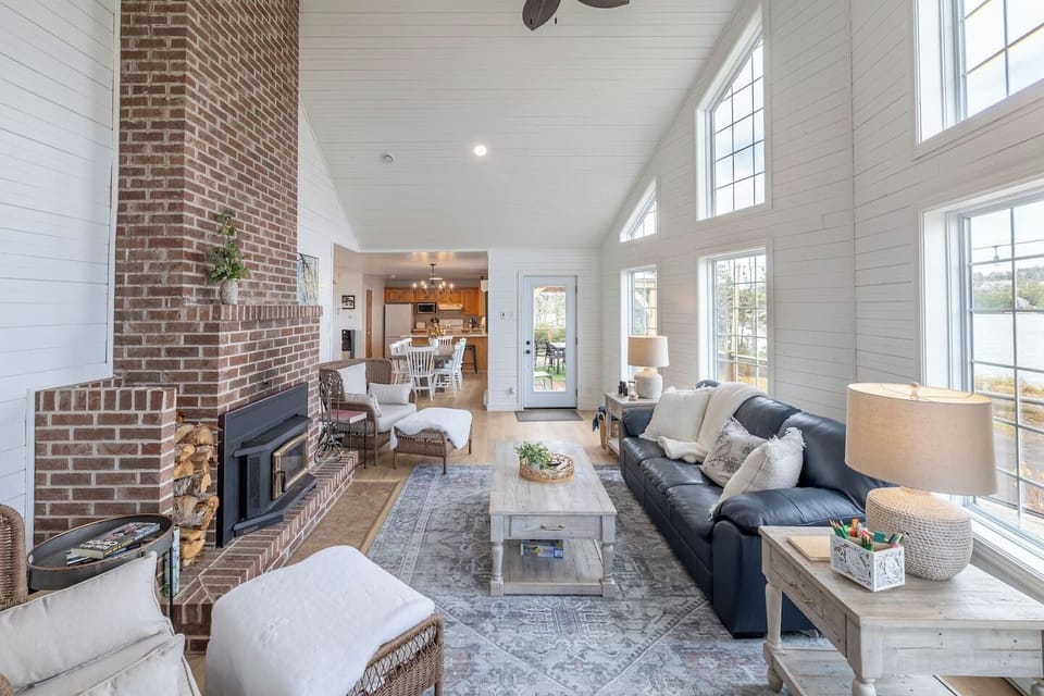 A-frame open concept living room facing pond
