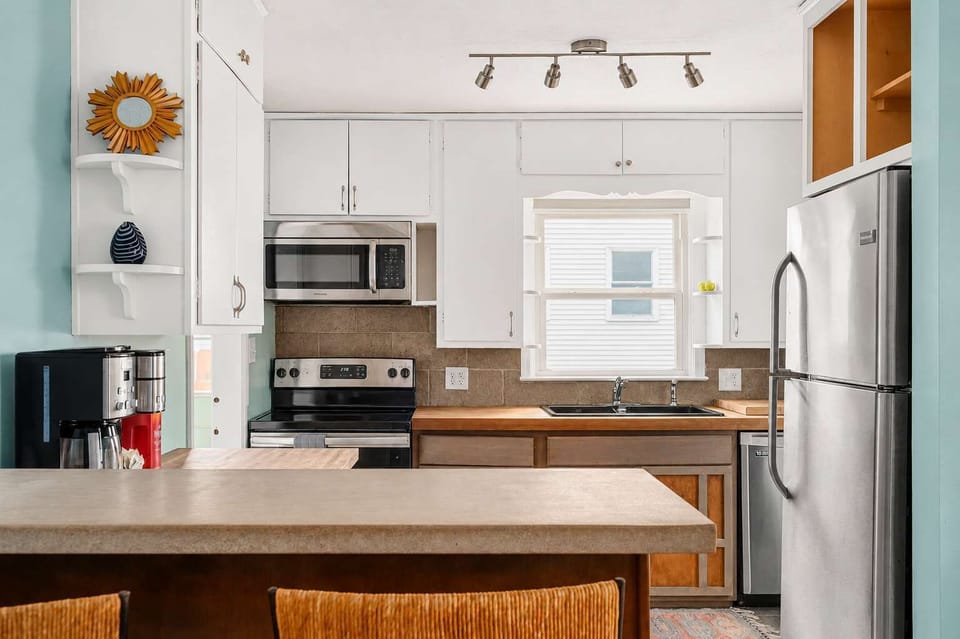 Bright Kitchen with Breakfast Bar | Gather for Coffee, Conversation, and Easy Meals Together