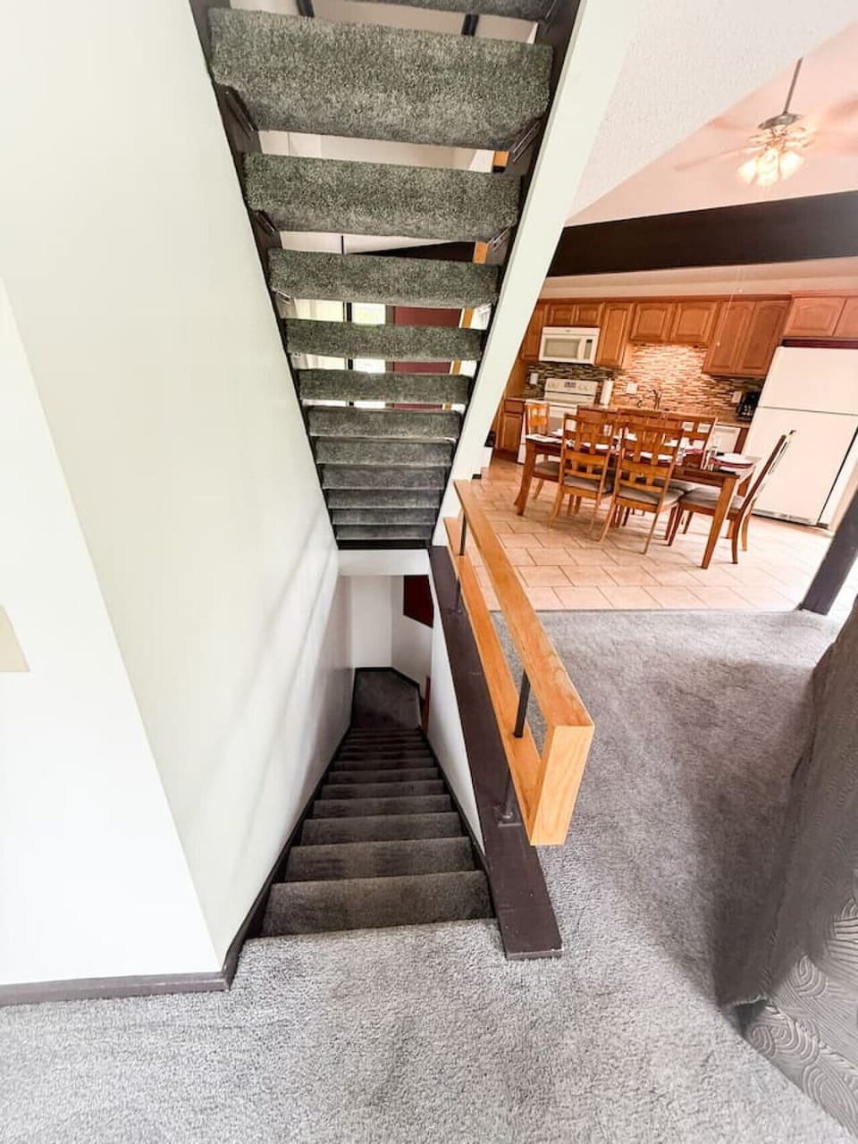 Climb to your treetop retreat—stairs lead you to peaceful, elevated living areas.