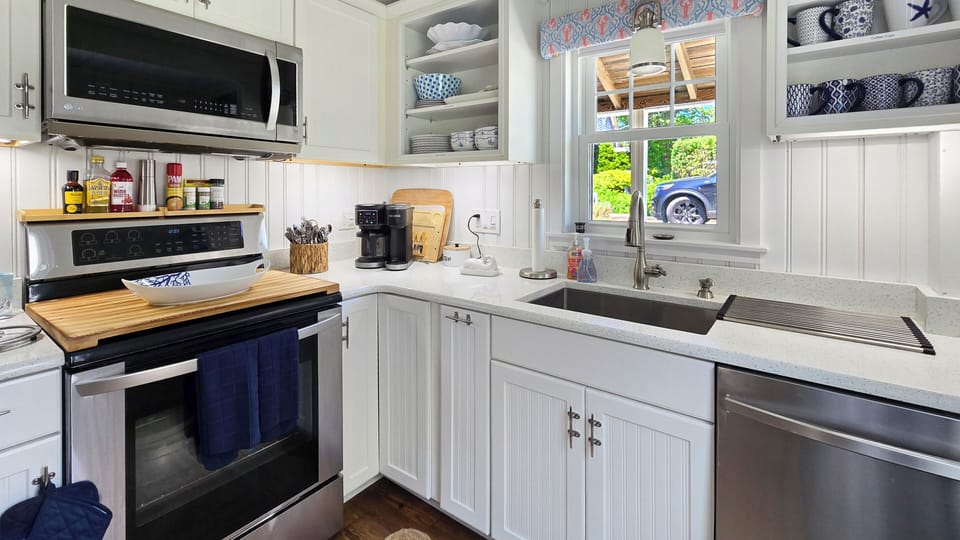 Nicely equipped kitchen with stainless appliances