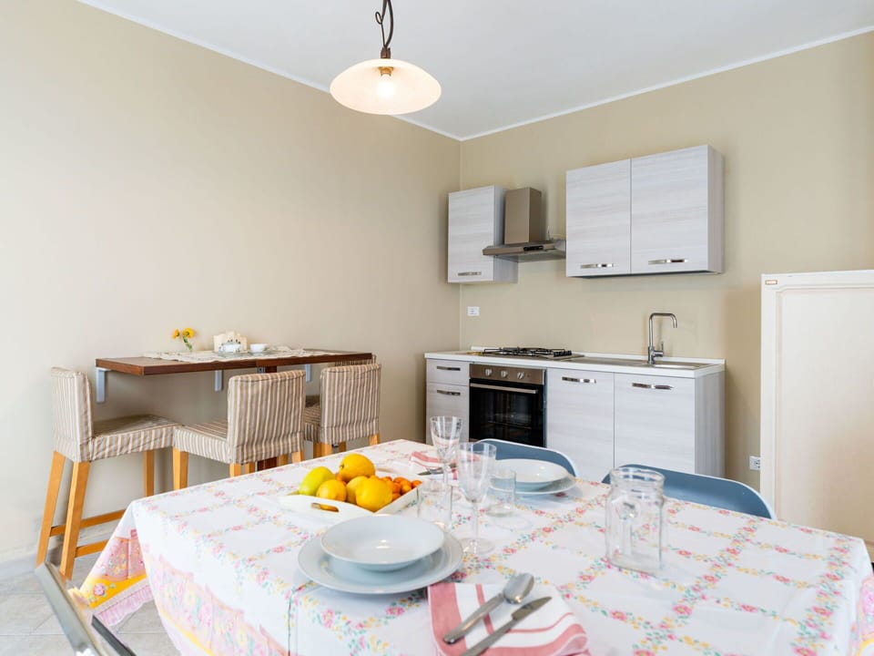 Furniture, Interior Design, Flooring, Floor, Wood, Ceiling, Room, Textile, Table, Lighting