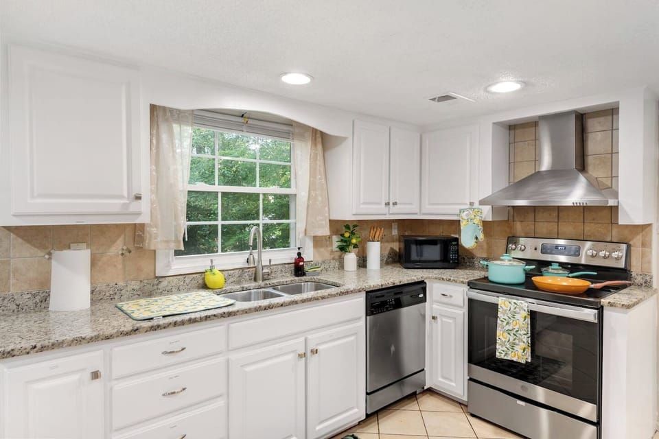 This kitchen combines modern functionality with charming finishes, making mealtime feel like home.